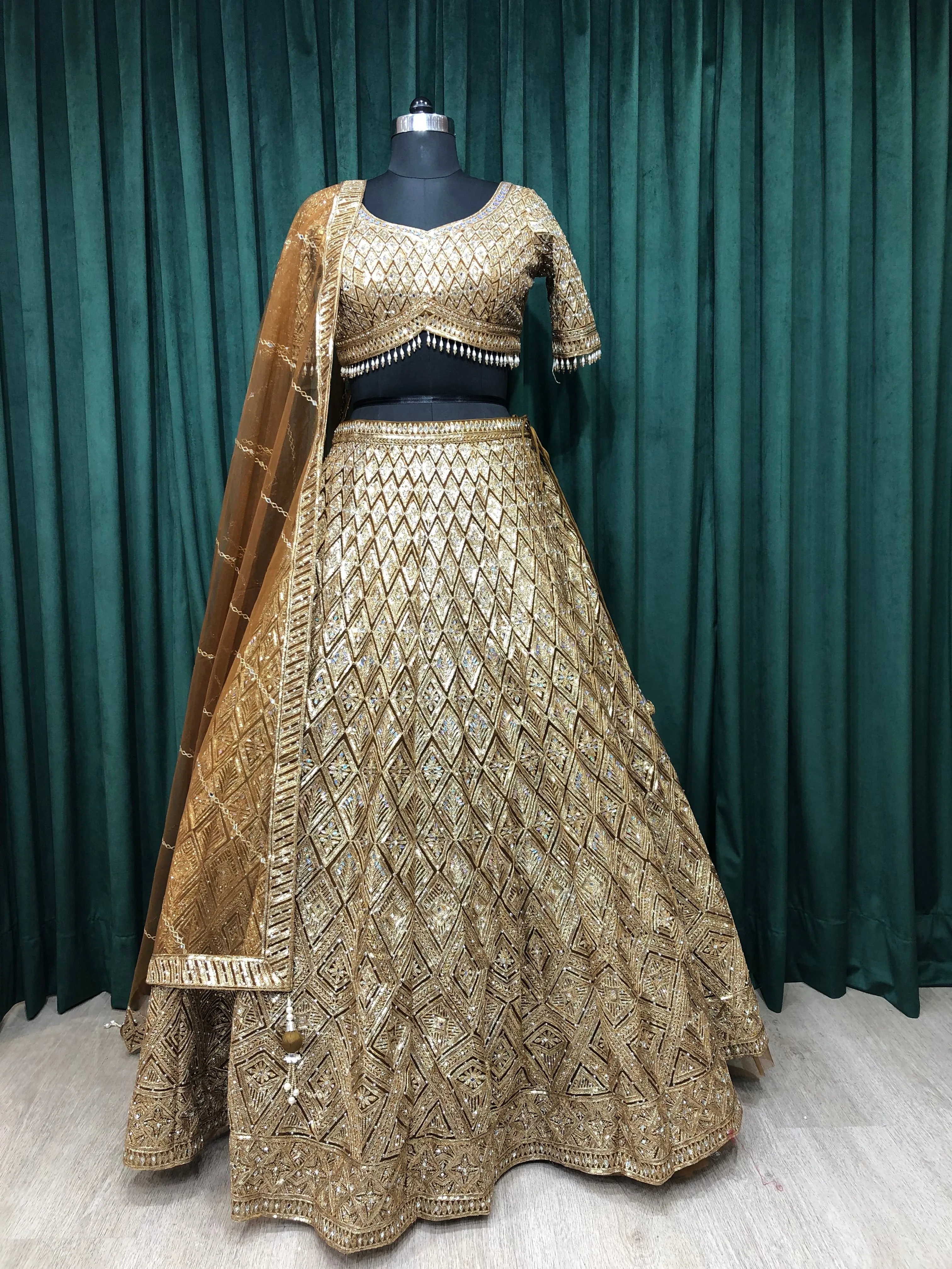 Golden Net Lehenga with Sequins Work